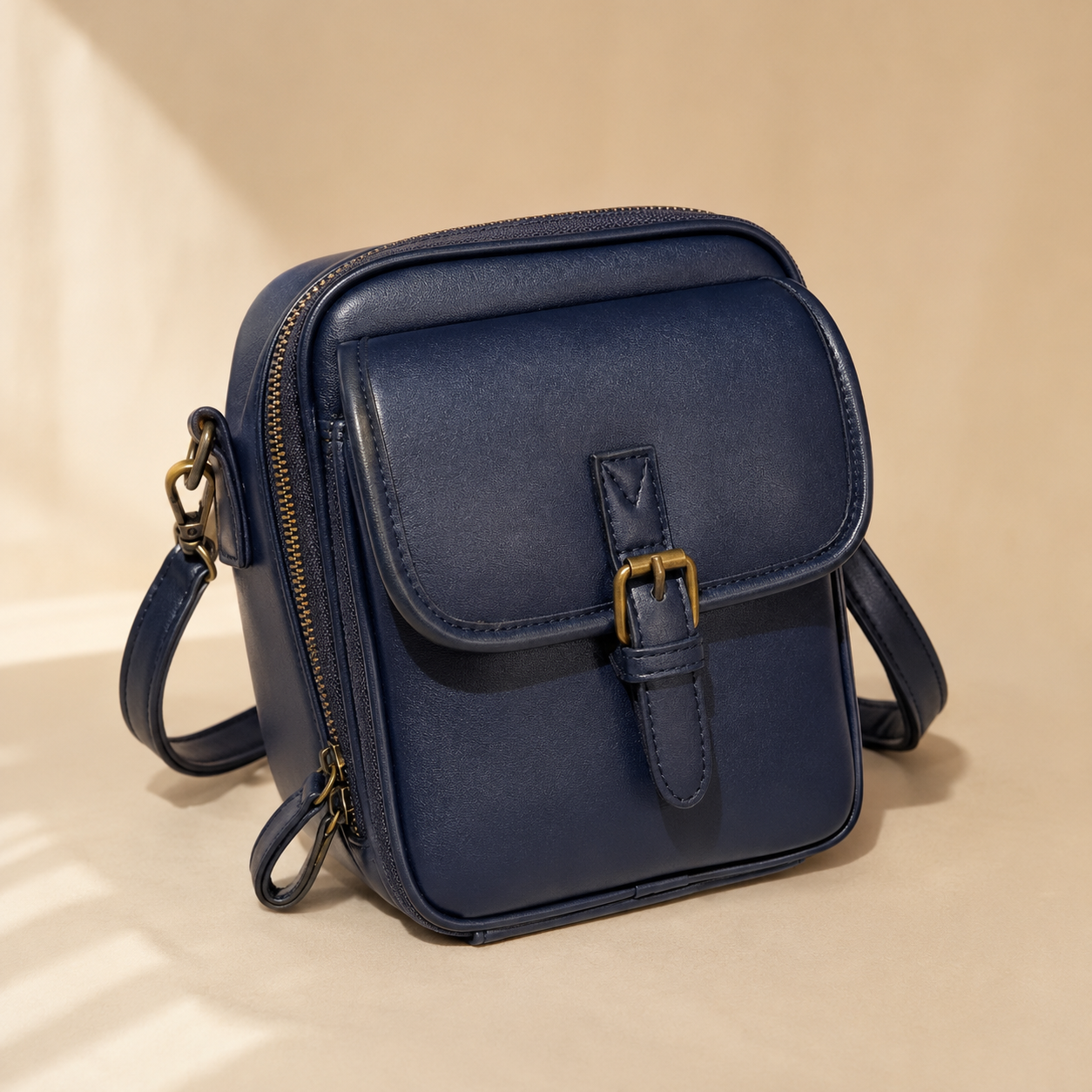 Solene – Structured PU crossbody bag with built-in wallet and glasses compartment