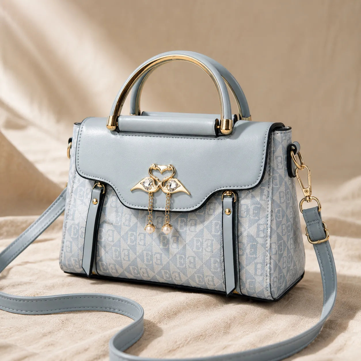 Velora – Swan-Clasp Structured Crossbody Bag with Gold Hardware