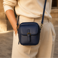 Solene – Structured PU crossbody bag with built-in wallet and glasses compartment