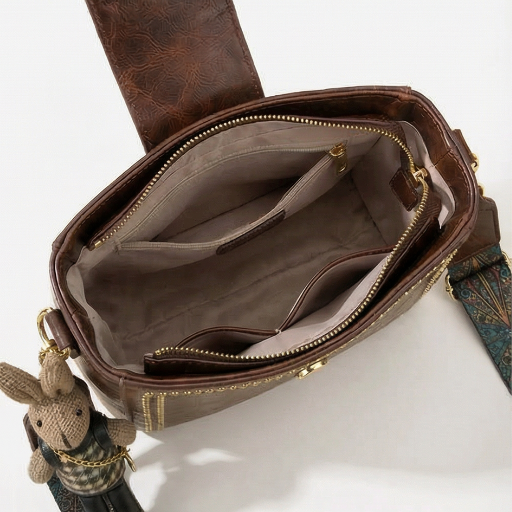 Trovata - Vintage crossbody bucket bag with artisan strap