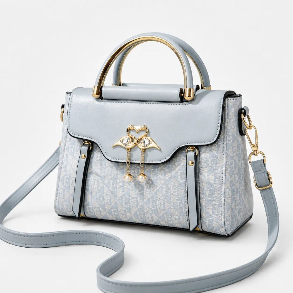 Velora – Swan-Clasp Structured Crossbody Bag with Gold Hardware