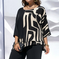 Eloria – Elegant Oversized Statement Top