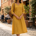 Solenne – Relaxed V-Neck Midi Dress